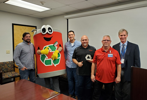 Group photo with recycling mascot