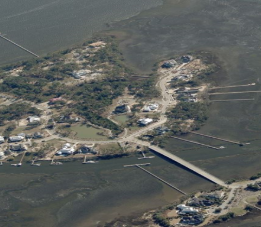 A photo of a bridge crossing a river to an island